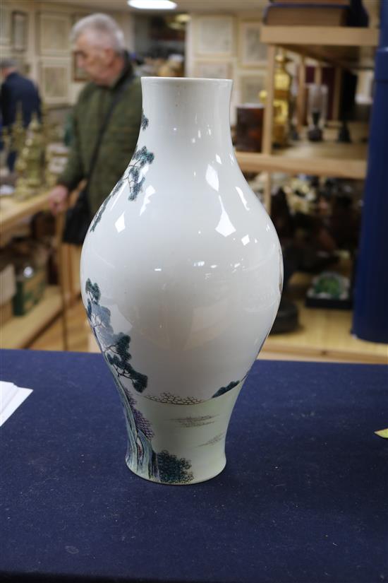 A Chinese famille rose baluster shaped vase, 20th century, height 33cm, wood stand